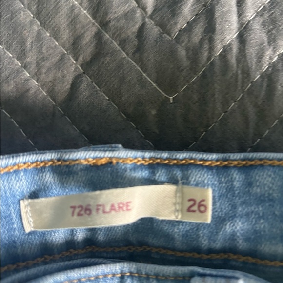 Levi’s 726 Flare Size 26x30 Medium Wash.  Cut out knees. Stretch - Picture 2 of 6